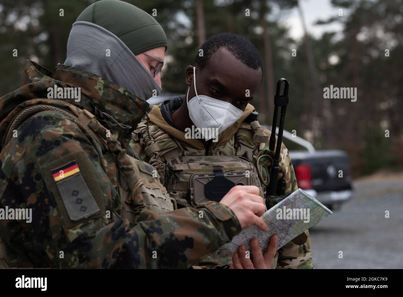 https://c8.alamy.com/comp/2GKC7K9/a-german-army-capt-shows-a-location-to-staff-sgt-demarcus-harrison-2nd-air-support-operations-squadron-strike-team-non-commissioned-officer-in-charge-during-exercise-agile-fury-21-at-the-grafenwhr-training-area-germany-march-8-2021-tactical-air-control-party-members-guide-aircraft-to-enemy-locations-and-increase-the-strength-of-ground-forces-2GKC7K9.jpg