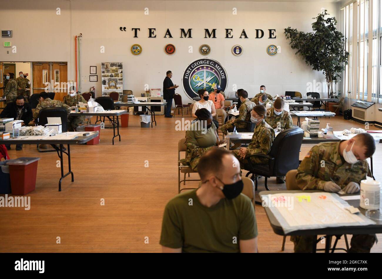 U.S. Marines from MARFORCYBER, receive the COVID19 vaccination at the