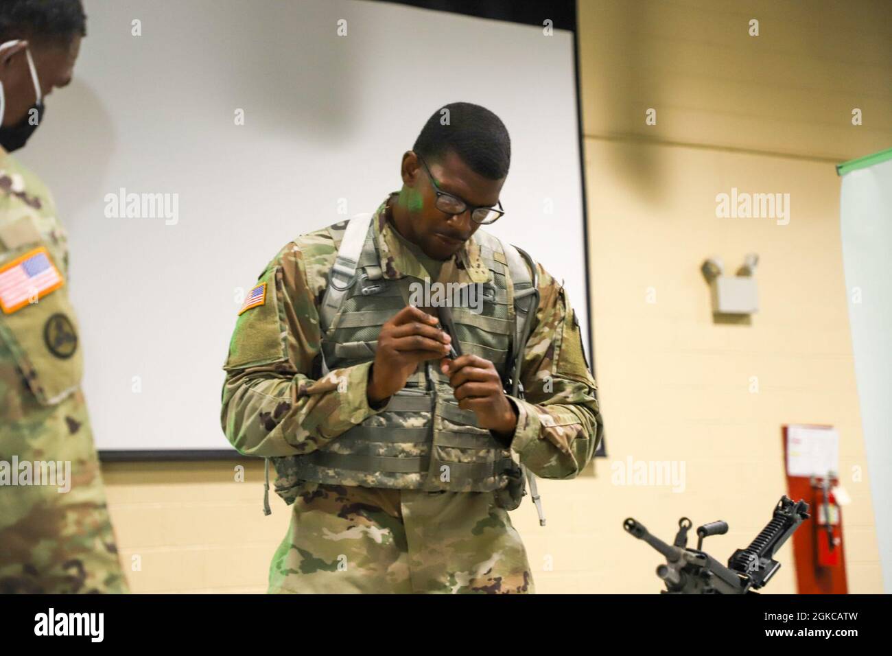 Sgt. Reginald Ritter assembling the M249, M4, and M9 in the Best