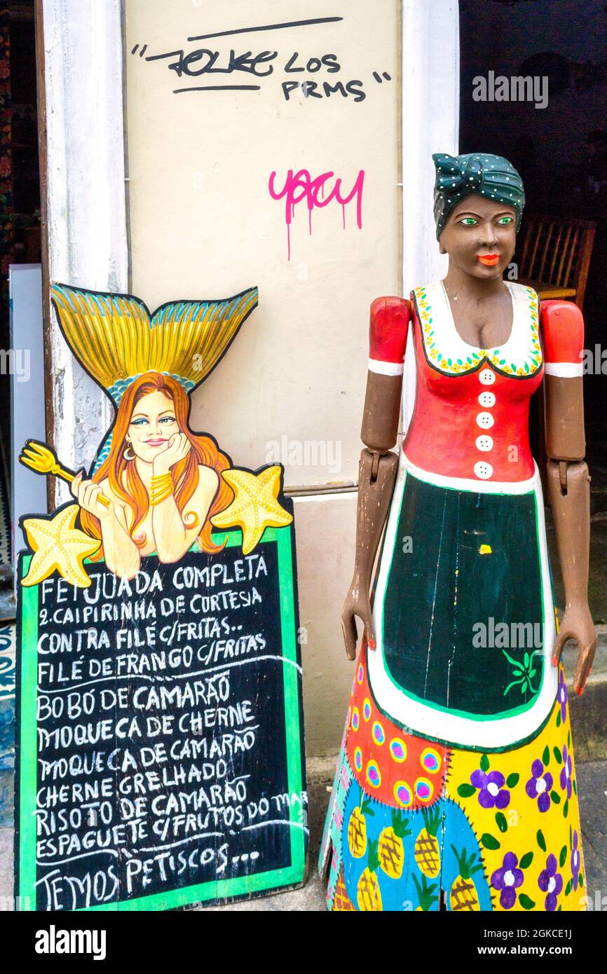 Brazilian traditional doll decorating the entrance of a restaurant in the Santa Teresa district in Rio de Janeiro, Brazil. This bohemian district is a Stock Photo