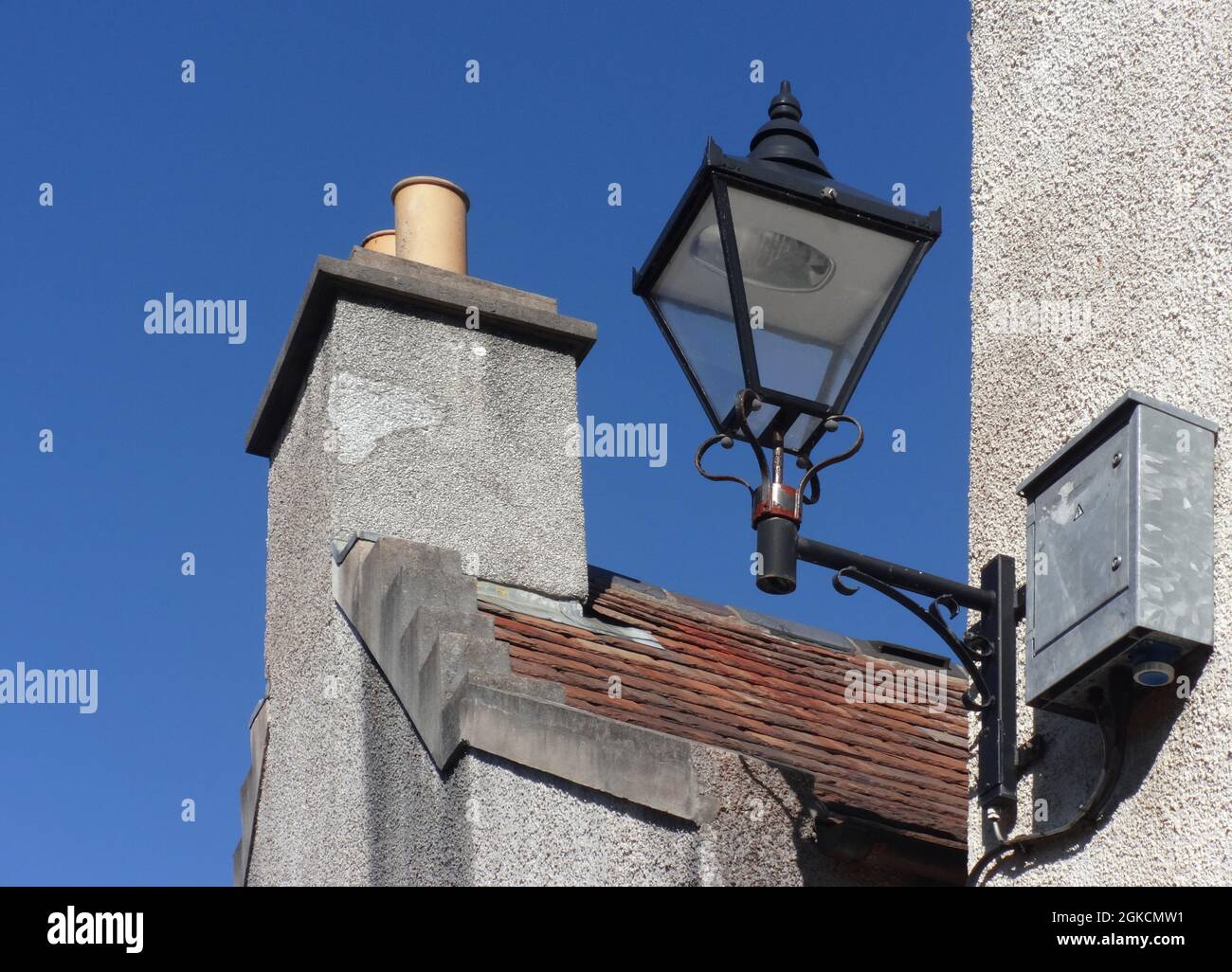 old street lamp on the wall, Oarkney, Kirkwall, Scotland Stock Photo