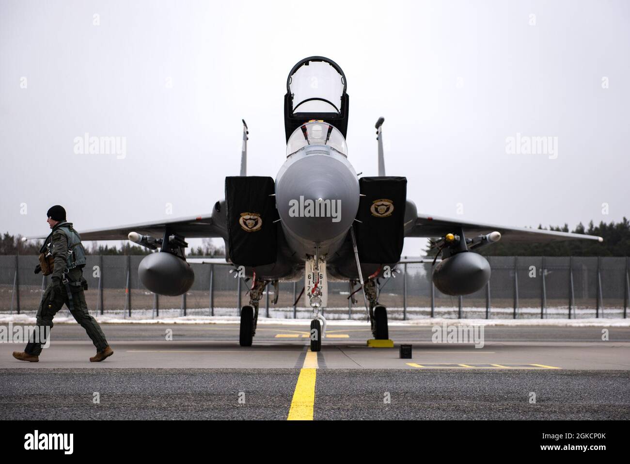 An F-15C Eagle assigned to the 493rd Fighter Squadron sits on the apron after arriving at Amari Air Base, Estonia, in support of Exercise Baltic Trident, March 15, 2021. Exercises like this strengthen interoperability with NATO allies and partner nations, and increase 48th FW sortie generation and sustainment capabilities away from home station through the application of Agile Combat Employment concepts. Stock Photo