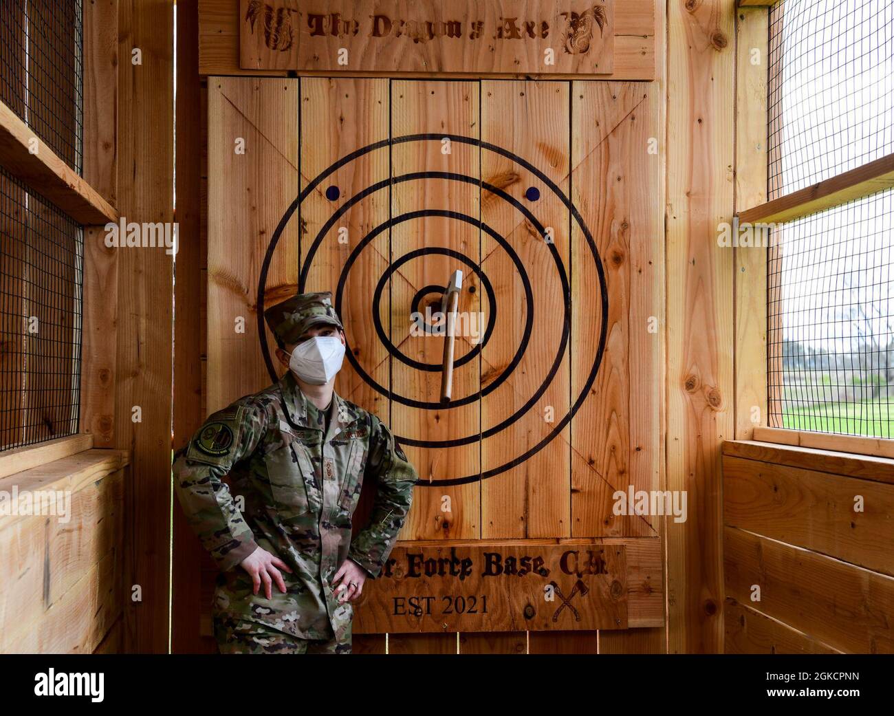 Chief Master Sgt. Tori Jones, wing command chief, stands next to her
