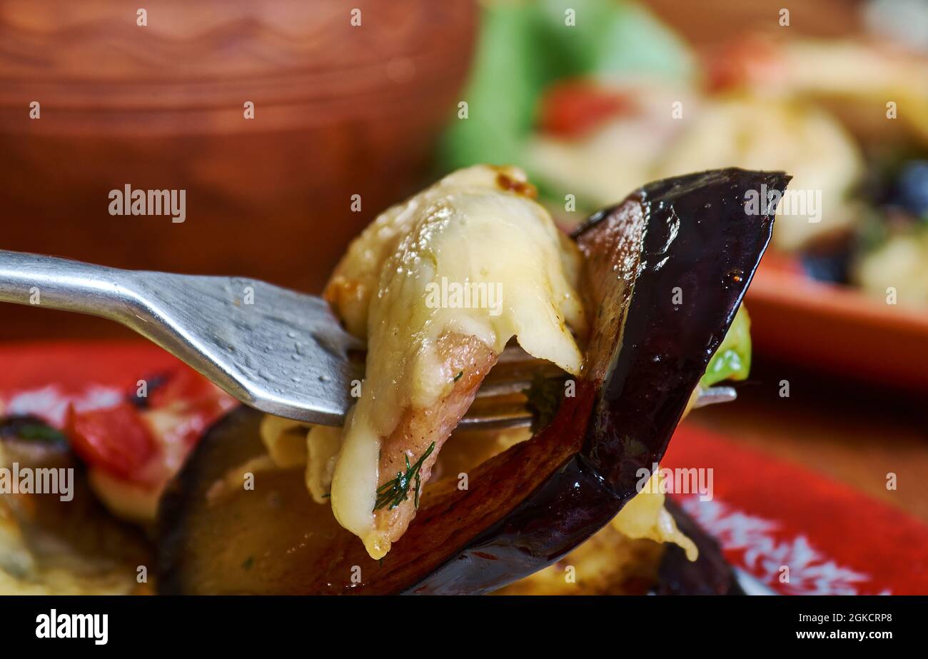 Melanzane al forno gratin Baked eggplant with chicken and cheese Stock