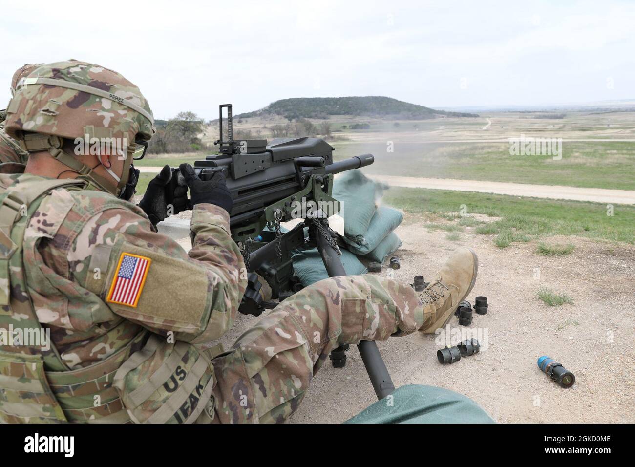 Spc. Christian Perez, Headquarters and Headquarters Company, 40th Combat Aviation Brigade, fires the MK19 grenade launcher, March 17, 2021 at North Fort Hood, Texas. Stock Photo