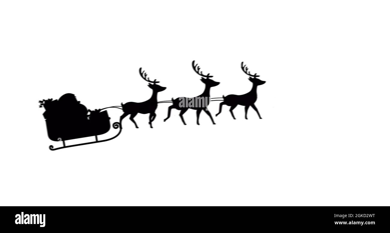 Digital image of black silhouette of santa claus in sleigh being pulled ...