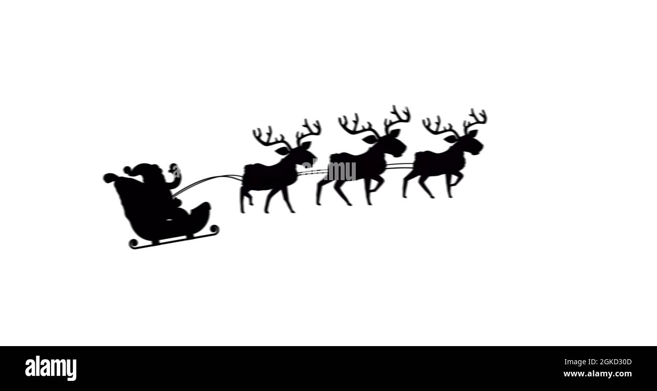 Digital image of black silhouette of santa claus in sleigh being pulled ...