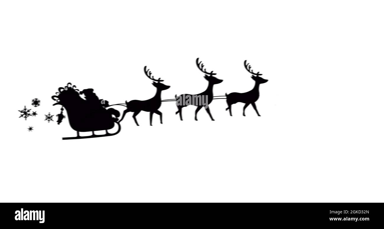 Image of black silhouette of santa claus in sleigh being pulled by ...