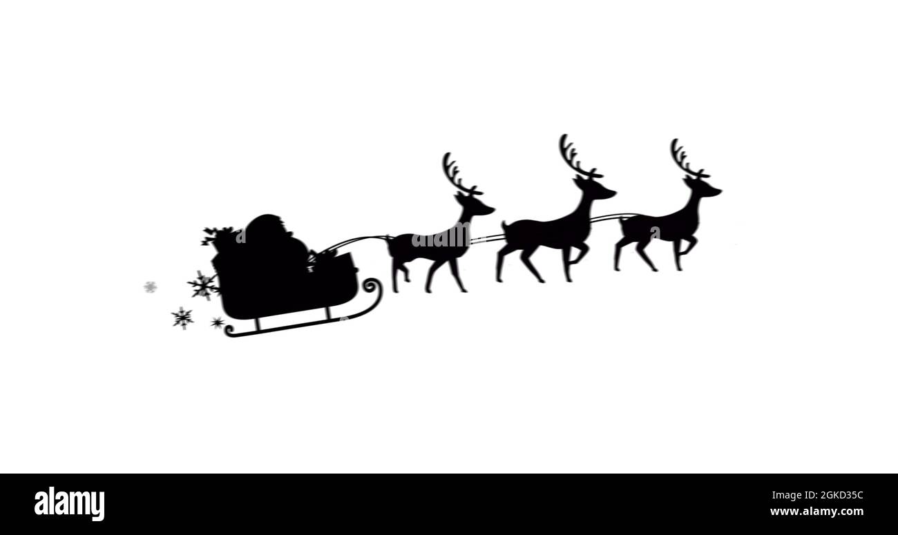 Image of black silhouette of santa claus in sleigh being pulled by ...