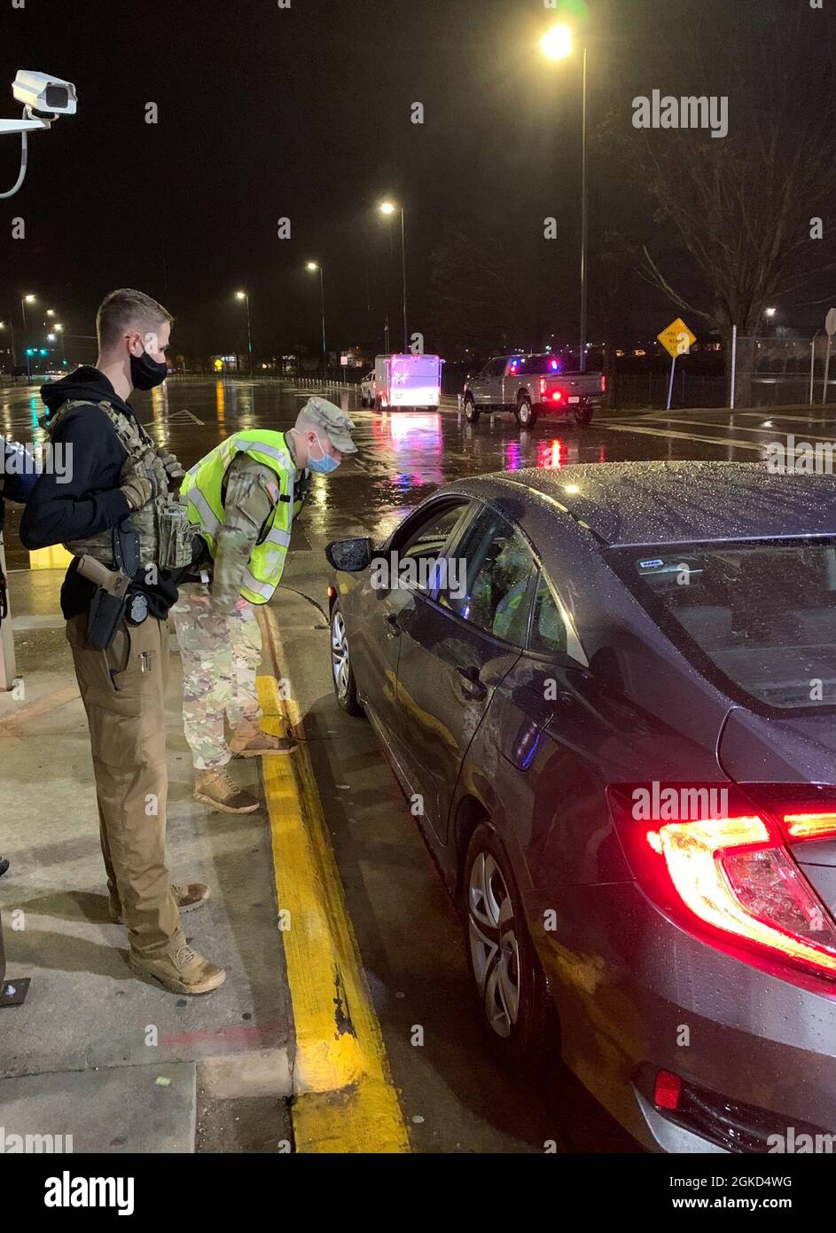 Specialist Jaxon Wright, 163rd Military Police Detachment, 716th Military Police Battalion, speaks with a driver March 17 at a sobriety checkpoint on Fort Campbell. Also pictured is Investigator Avery Neitzel, 163rd MP Co. According to the National Highway Traffic Safety Administration, 28 people in the U.S. die in drunk driving crashes each day. Fort Campbell hasn’t added onto that statistic in 2021, and the PMO’s sobriety checkpoints may be a factor. Stock Photo
