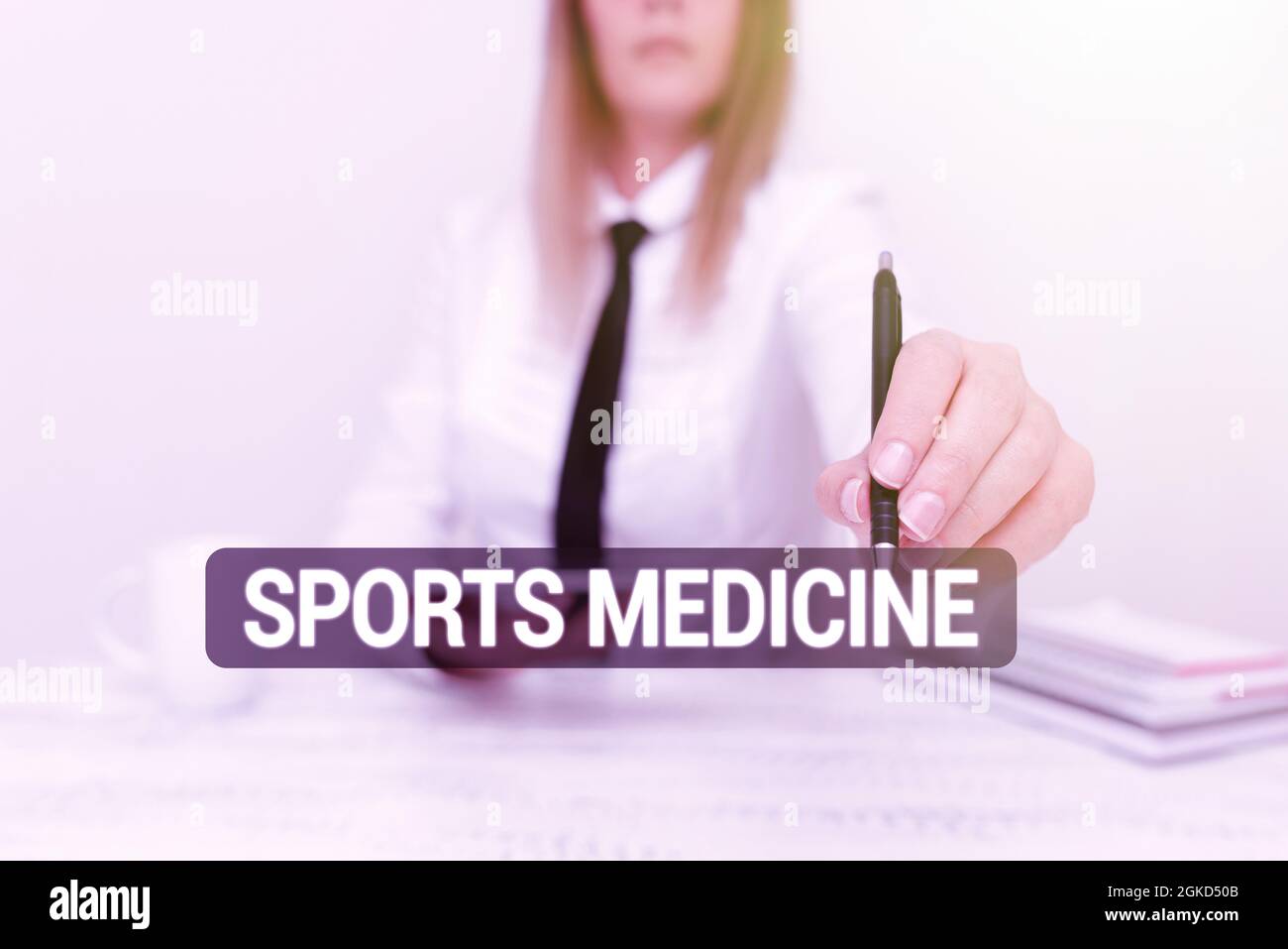 Handwriting text Sports Medicine. Business idea treatment and prevention of injuries related to sports Developer Discussing Gadget Upgrade, Presenting Stock Photo