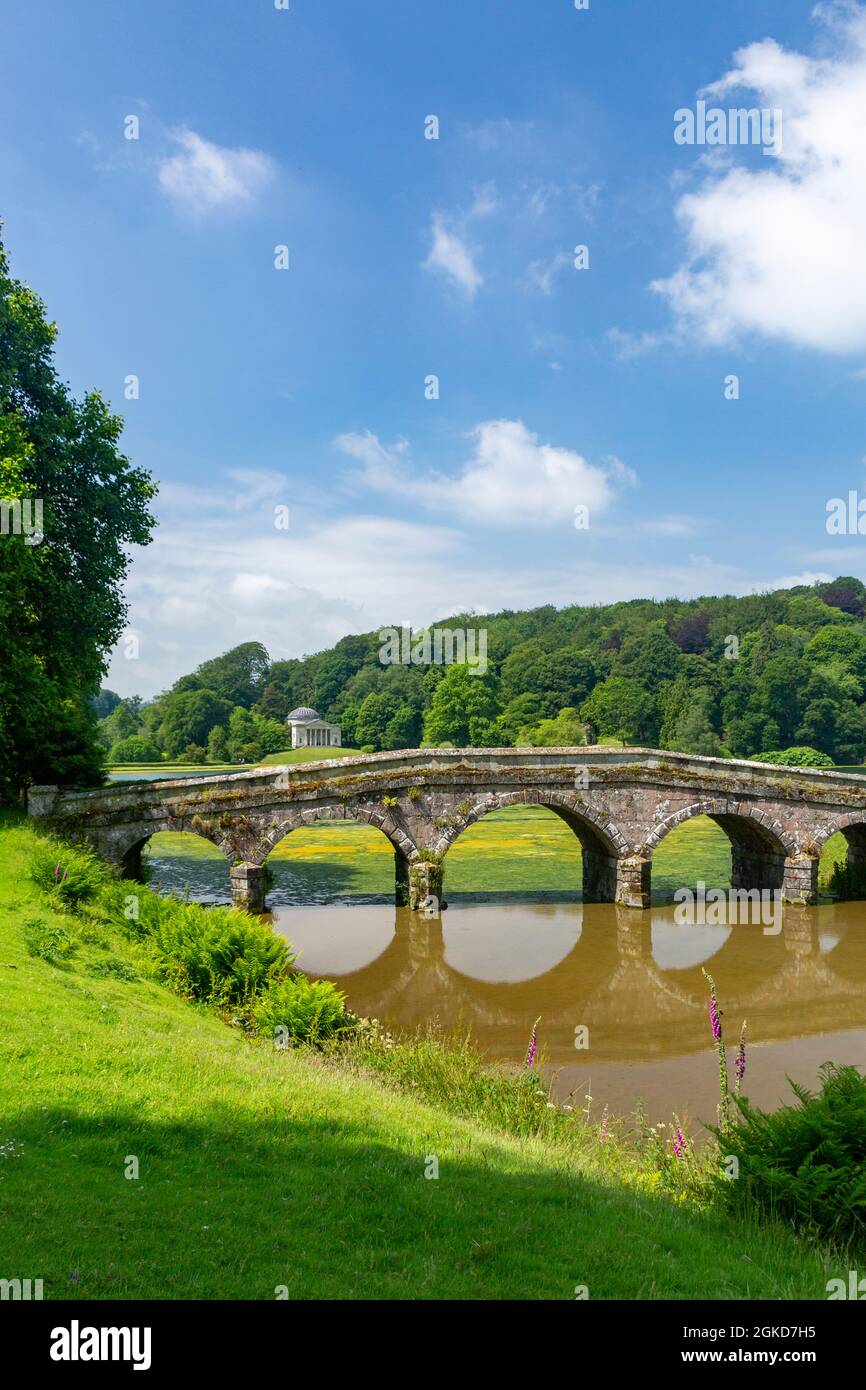 The Palladian bridge and lake in Stourhead Gardens, Wiltshire, England, UK Stock Photo
