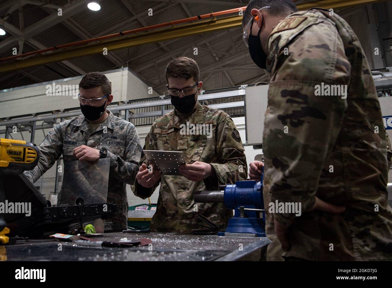 U S Air Force Staff Sgt Timothy Bond 305th Maintenance Squadron Electrical And Environmental Technician Analyzes A Sheet Metal Patch At Joint Base Mcguire Dix Lakehurst N J March 18 21 The 305th Mxs Partnered With