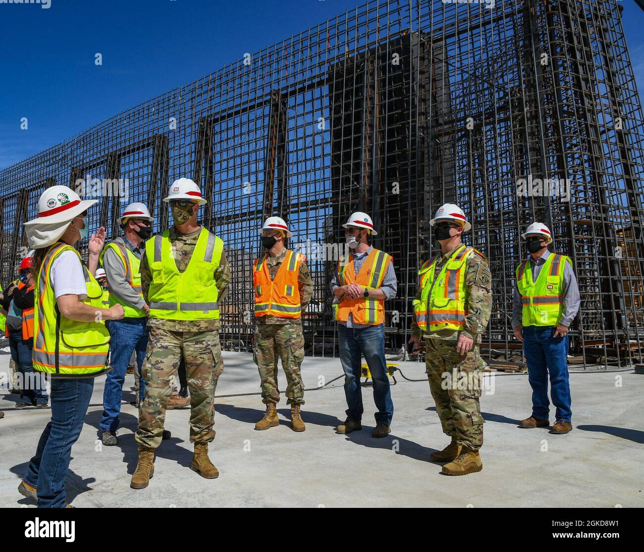 Tatia Taylor, engineering chief with the U.S. Army Corps of Engineers Sacramento District, briefs official visitors on the labyrinth weir at the Isabella Dam Safety Modification Project in Lake Isabella, California March 18, 2021. The official visitors included Maj. Gen. William Graham, USACE deputy commander of civil and emergency operations; Brig. Gen. Paul Owen, commander of the USACE South Pacific Division; Cheree Peterson SES, programs director for the South Pacific Division; and Col. James Handura, commander of the Sacramento District. The Isabella DSMP is one of the largest projects in Stock Photo