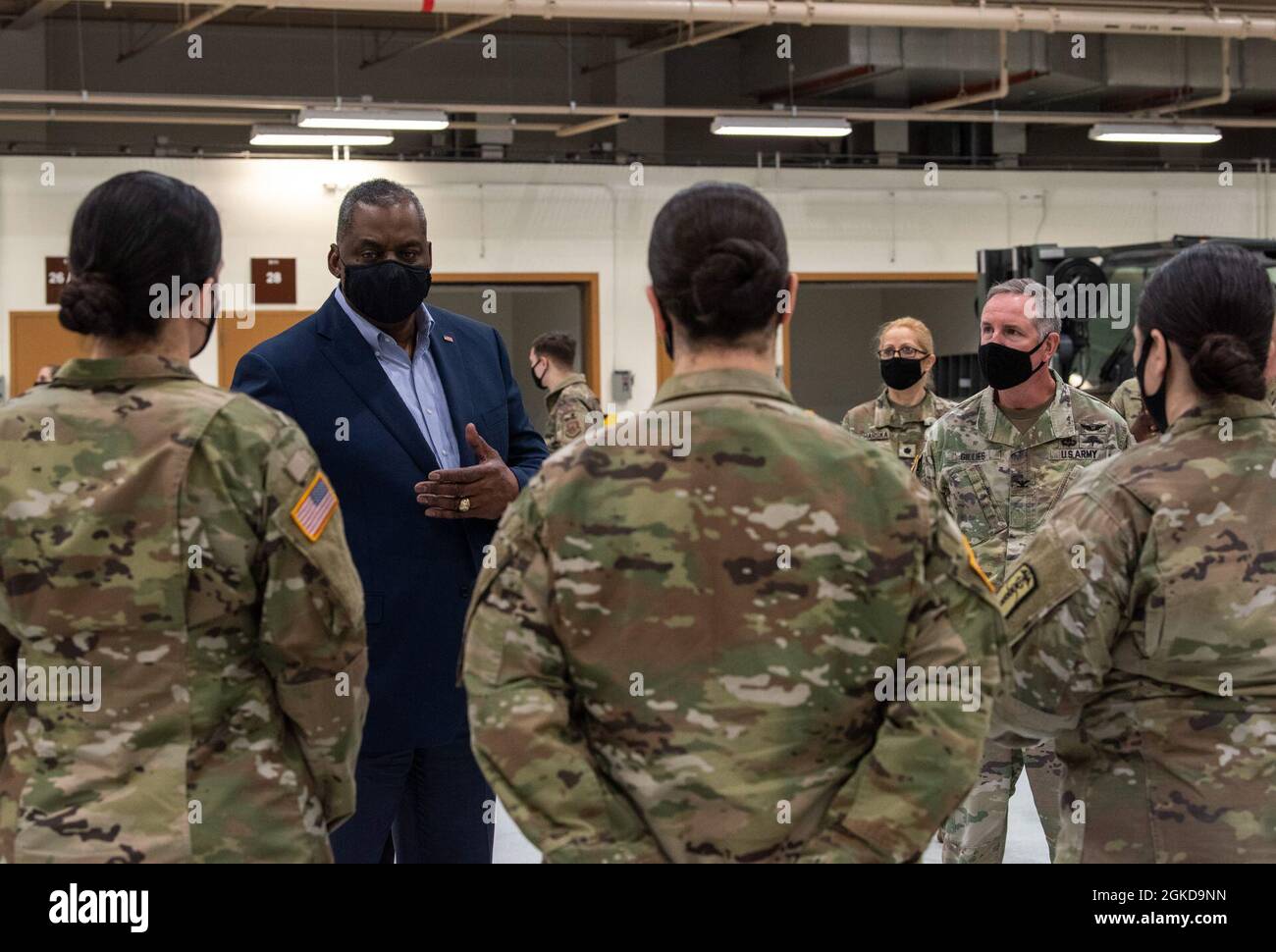 Secretary of Defense Lloyd J. Austin III meets with members of the 65th Medical Brigade at Osan Air Base, Republic of Korea, March 19, 2021. Stock Photo