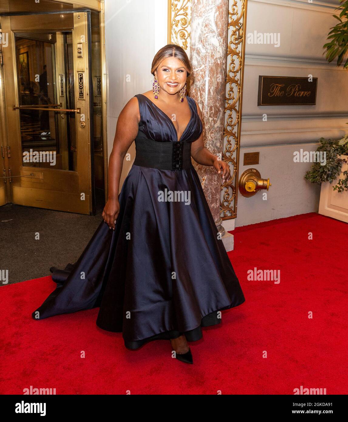 New York, NY - September 13, 2021: Mindy Kaling wearing dress by Tory Burch  departs The Pierre Hotel for the 2021 Met Gala Celebrating In America: A  Lexicon Of Fashion Stock Photo - Alamy