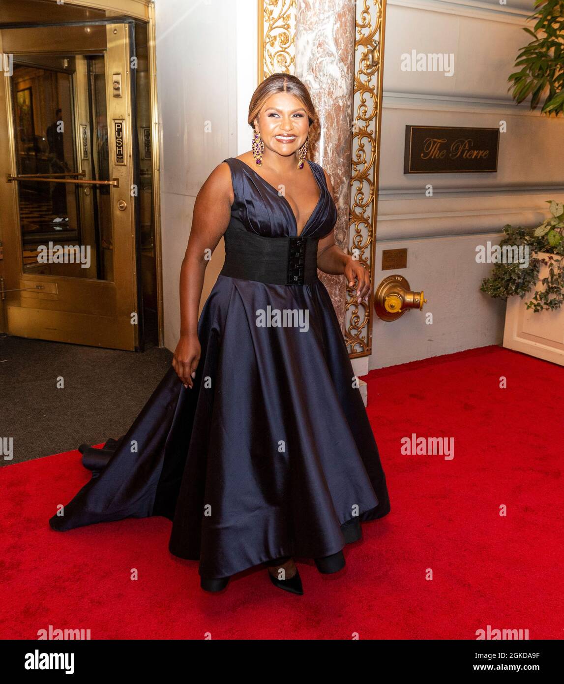 New York, NY - September 13, 2021:MindyKaling departs The Pierre Hotel for the 2021 Met Gala Celebrating In America: A Lexicon Of Fashion Stock Photo