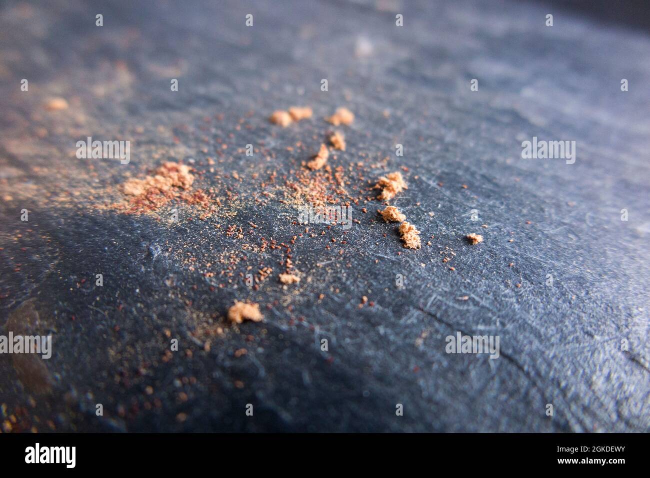 Bore dust, also known as frass, caused by emerging adult woodworm