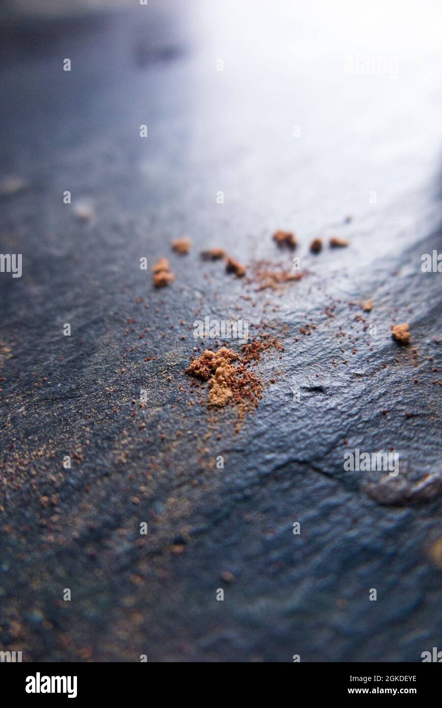 Bore dust, also known as frass, caused by emerging adult woodworm