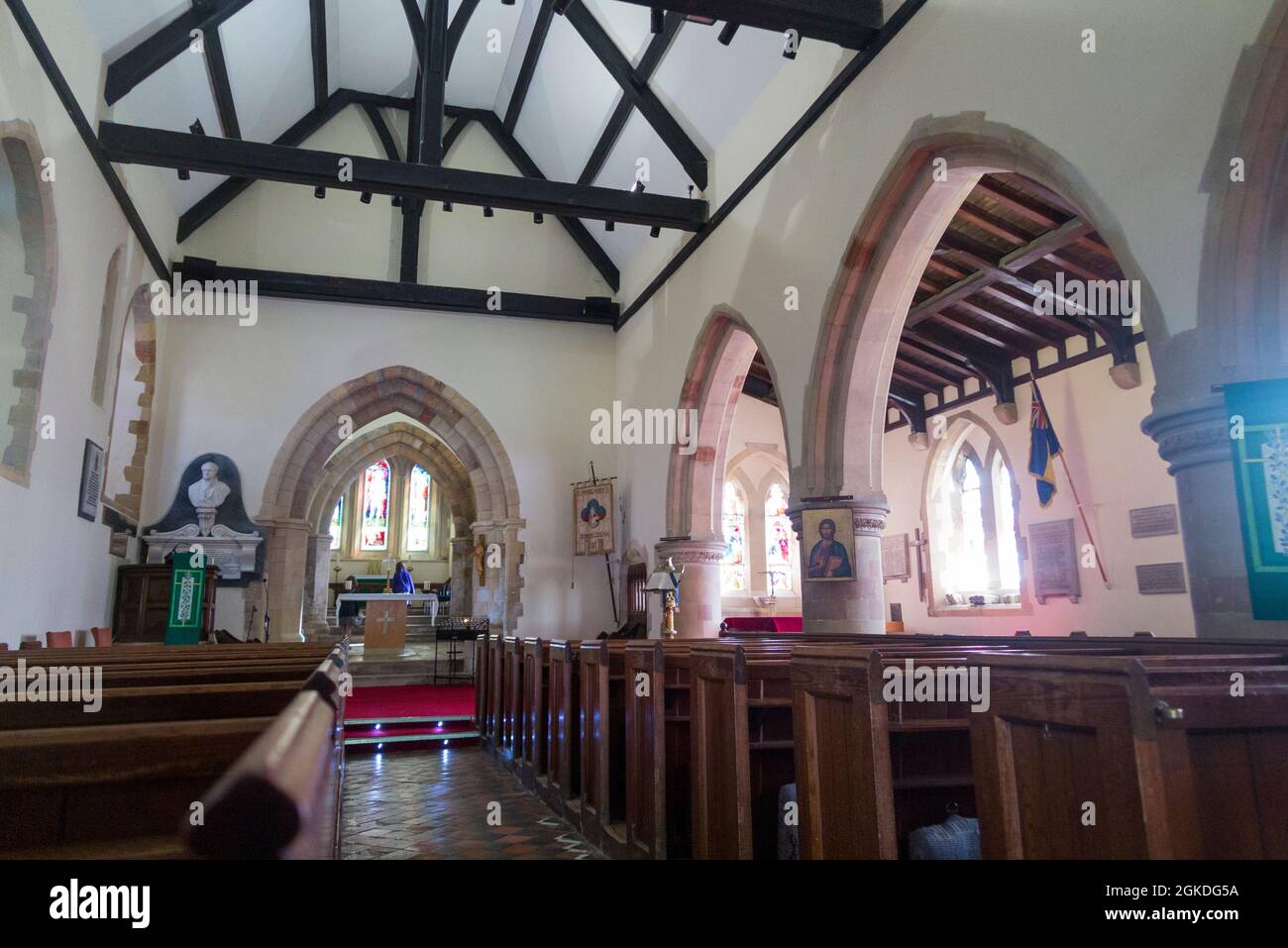 Interior / inside view of the nave looking towards the chancel and high altar of Saint Margaret's Church, Rottingdean, East Sussex England UK (127) Stock Photo
