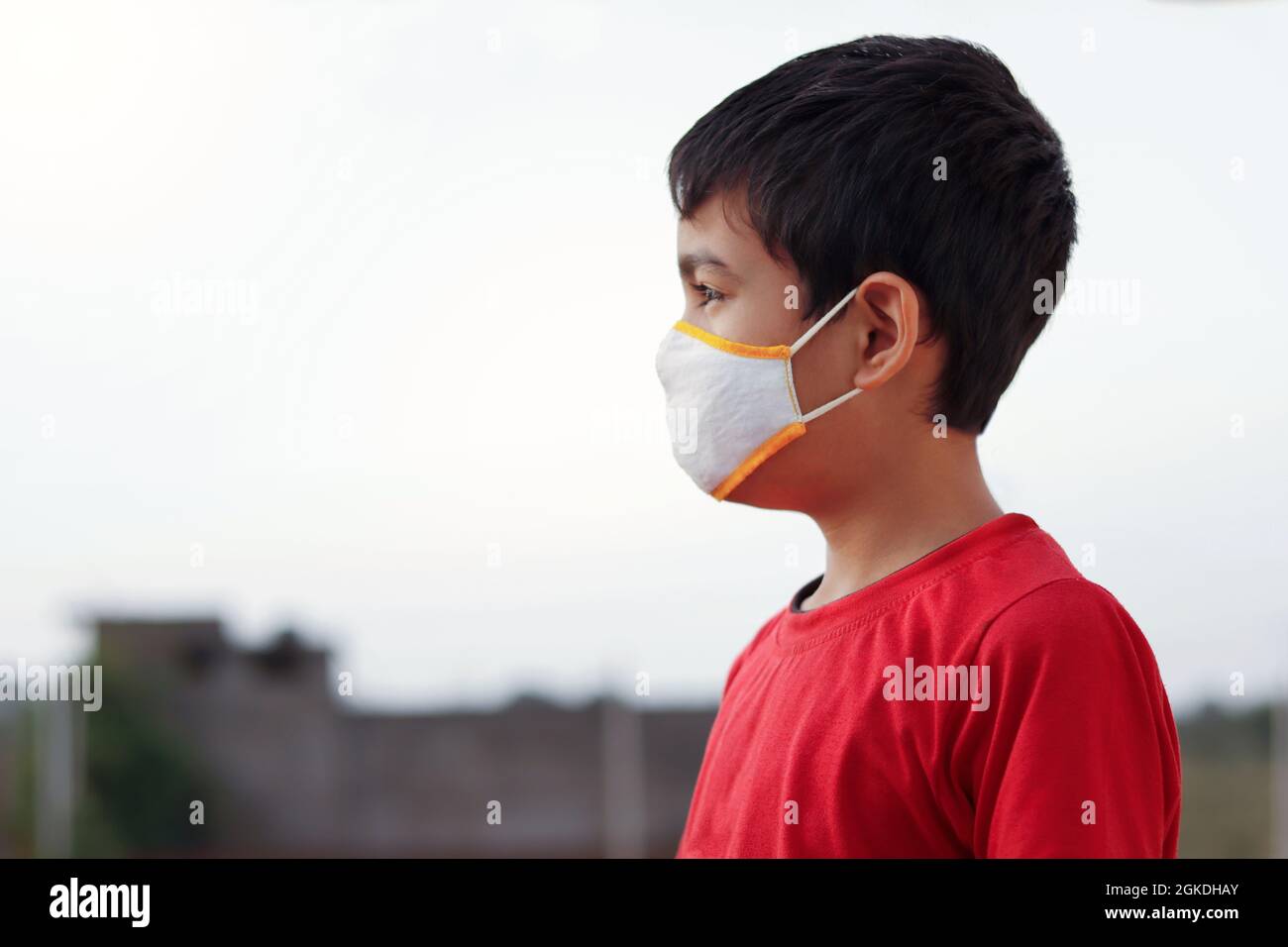 Little Indian cute boy wearing mask during corona virus and flu