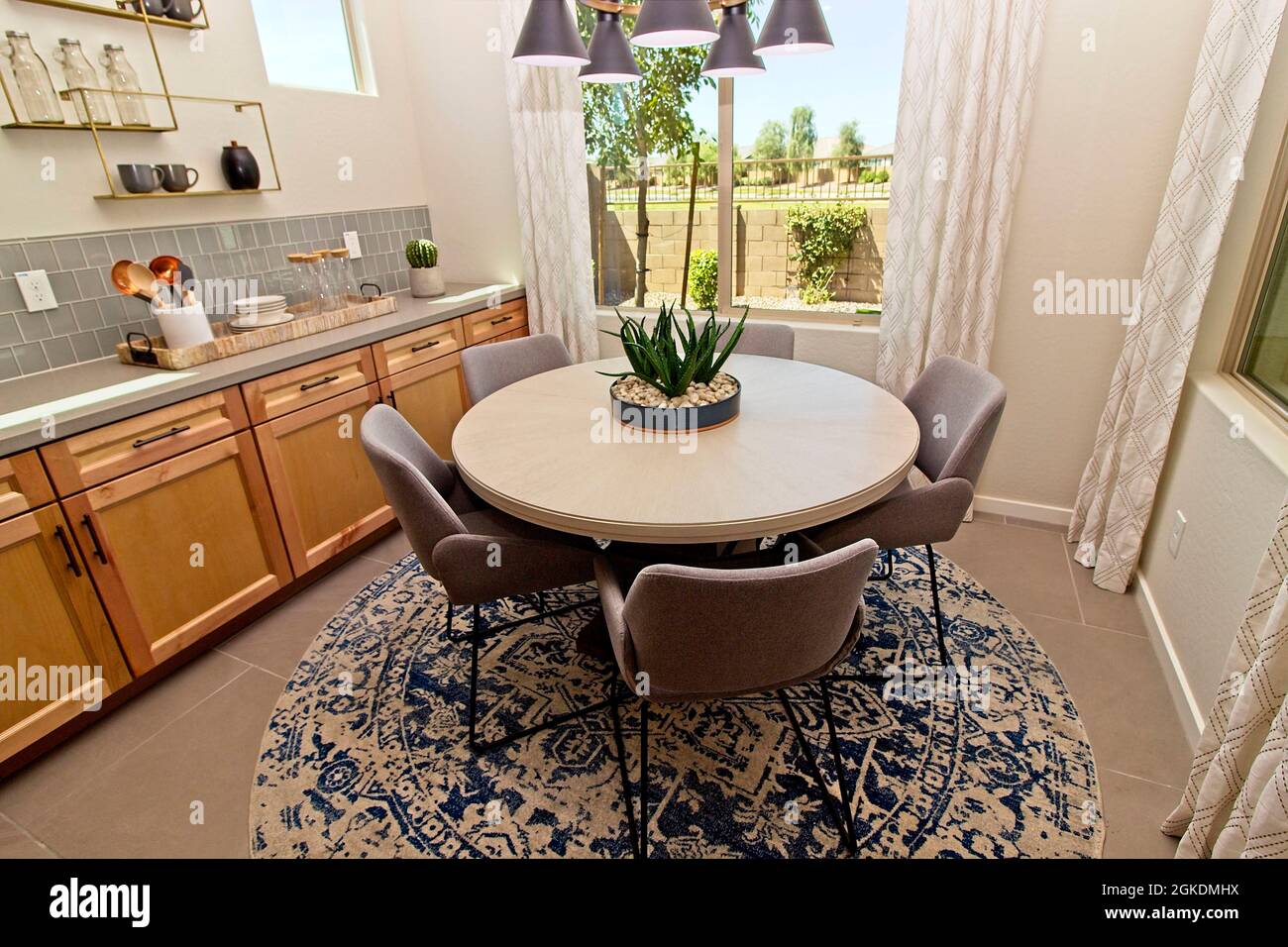Kitchen Dining Area With Long Counter Top And Decorator Items Stock Photo Alamy