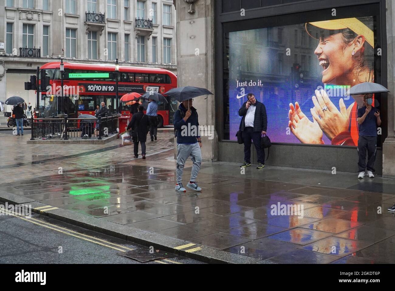 London, UK, 14 September 2021: At Nike Town at Oxford Circus in the heart  of the West End giant screens show images of tennis prodigy Emma Raducanu,  taken a moment after she