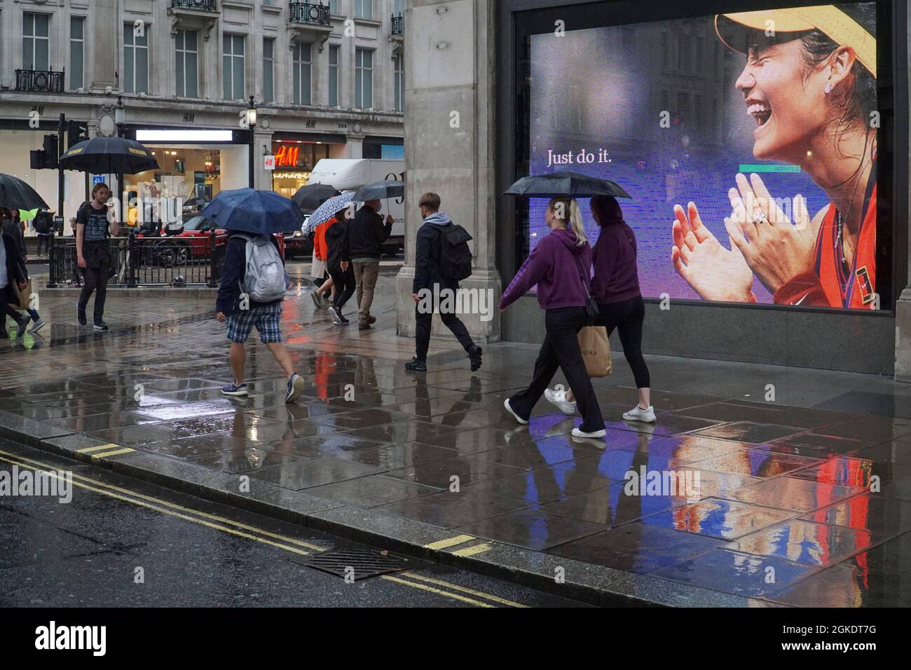 London, UK, 14 September 2021: At Nike Town at Oxford Circus in the heart  of the West End giant screens show images of tennis prodigy Emma Raducanu,  taken a moment after she