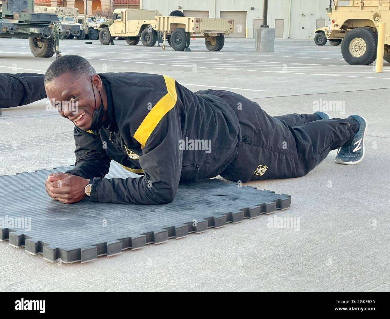 A Soldier assigned to the 32d AAMDC holds the plank position until time is called during the 32d AAMDC's Foundational Training Day, Swift and Sure day, here at Fort Bliss, Texas. Stock Photo
