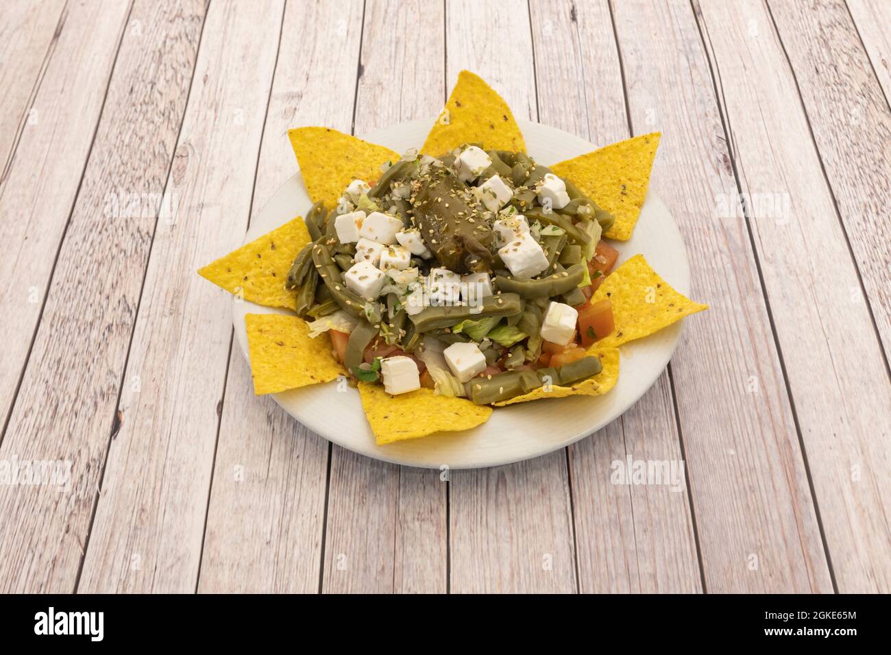 Great Mexican nopales salad with cheese, tomato, lettuce, chopped fresh