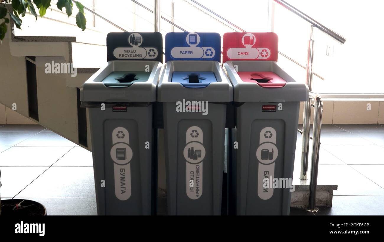 Close up of three public recycle bins. HDR. Waste segregation concept