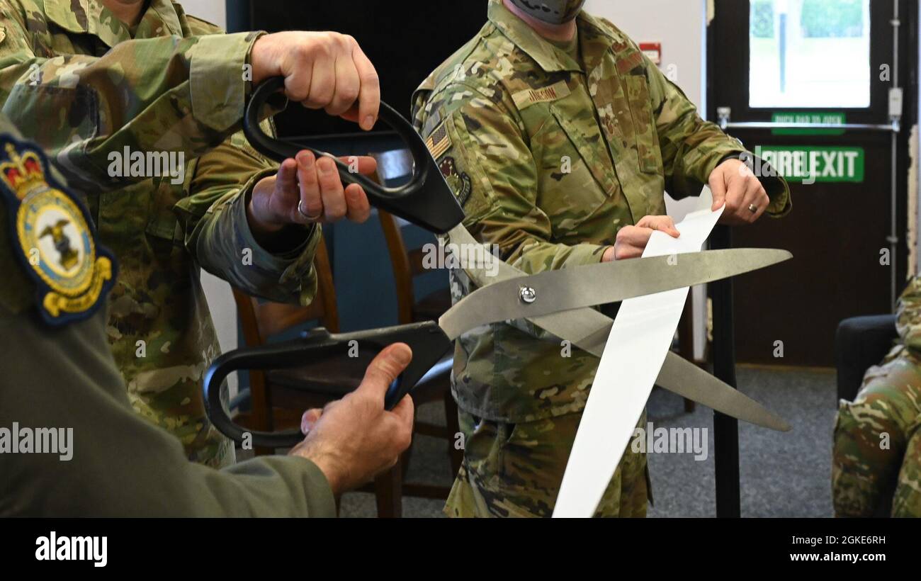48th Fighter Wing Leadership cut a ribbon during a grand opening ceremony to commemorate the Liberty Life Center at Royal Air Force Lakenheath, England, March 26, 2021. The Liberty Life Center serves as the new host for the Liberty Torchbearers program. Stock Photo