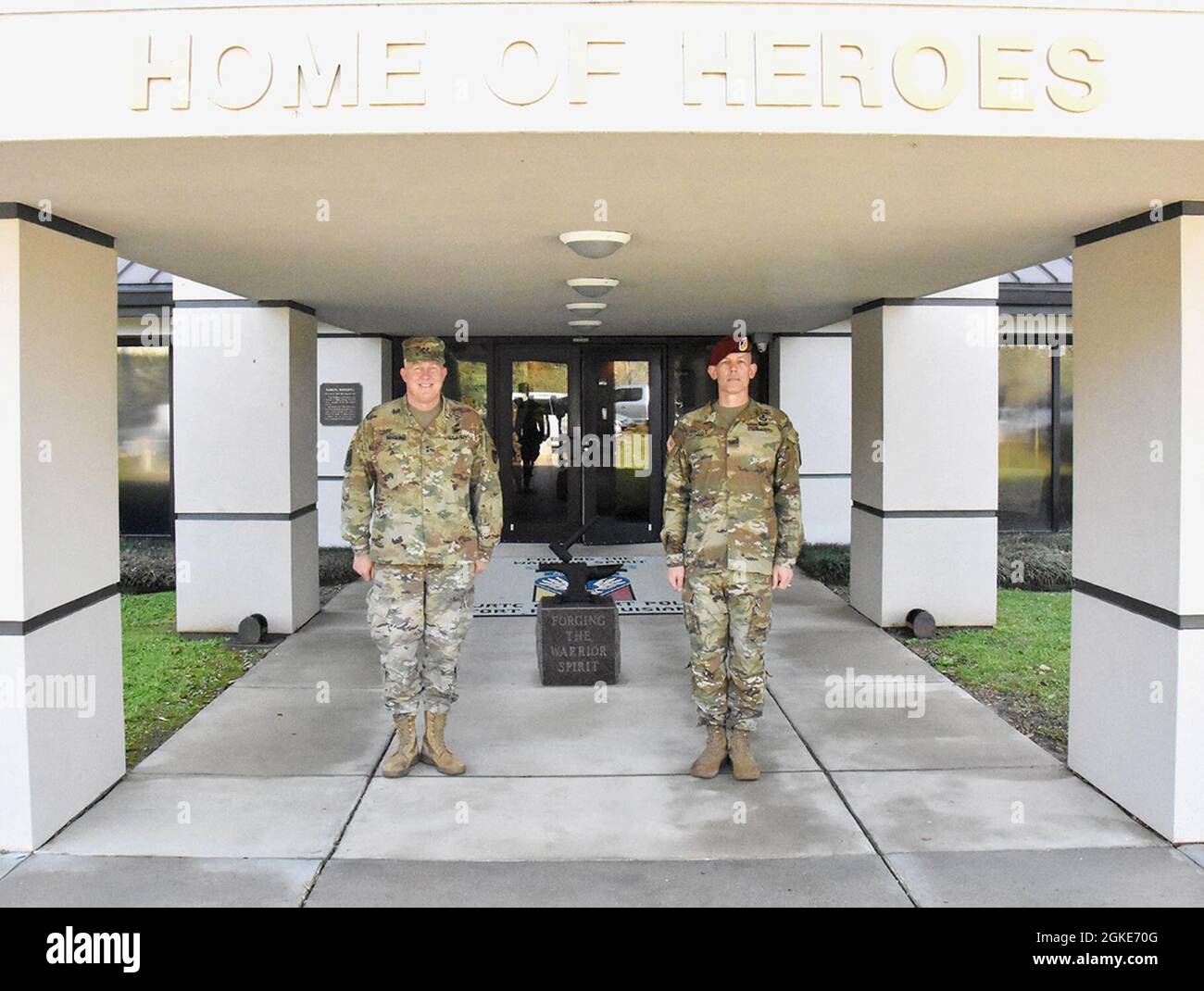 Maj. Gen. Timothy P. McGuire, (left) IMCOM deputy commander, and Brig. Gen. David S. Doyle, commander, JRTC and Fort Polk, stand in front of Woodfill Hall. Stock Photo