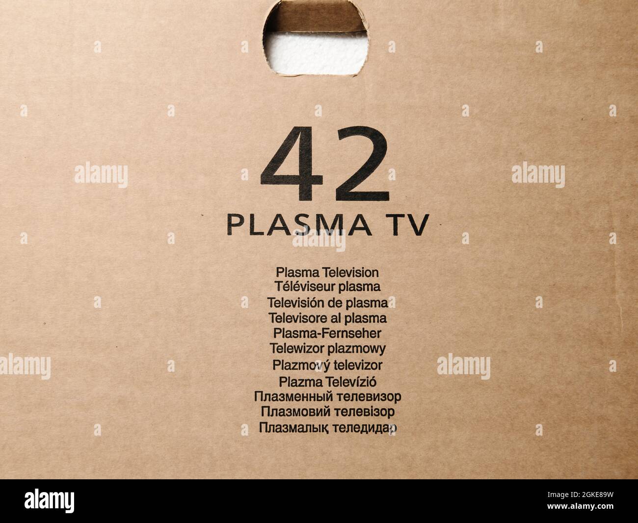 Signage on large cardboard Plasma 42 inch display with Plasma television text Stock Photo