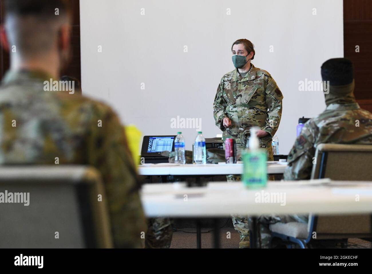 Heather Col Col. Heather Fox, 9th Reconnaissance Wing Commander, center, talks to ...