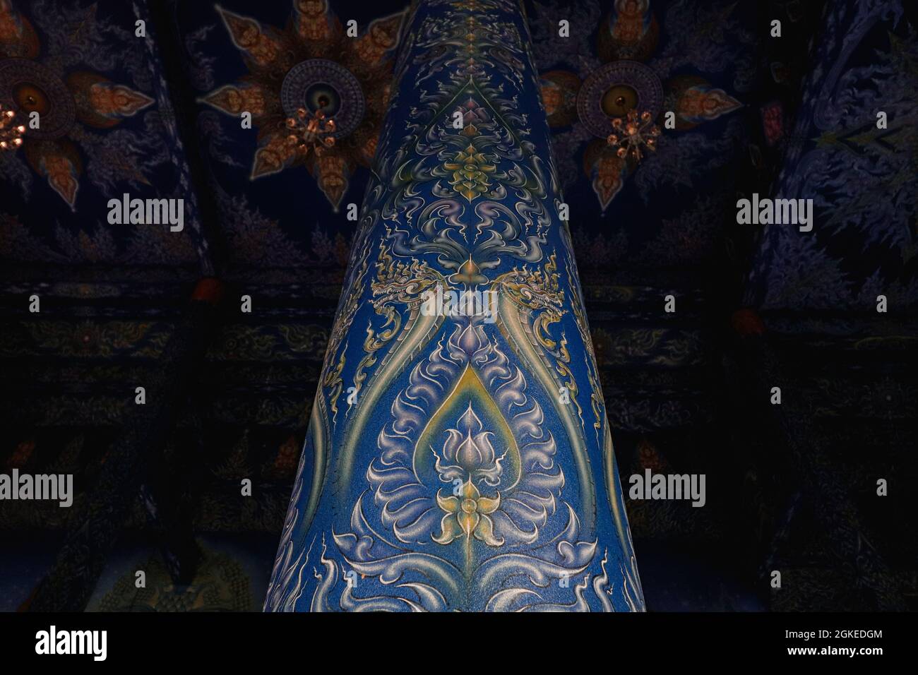 Column with dragons painting in the Blue Temple of Chiang Rai, Thailand ...