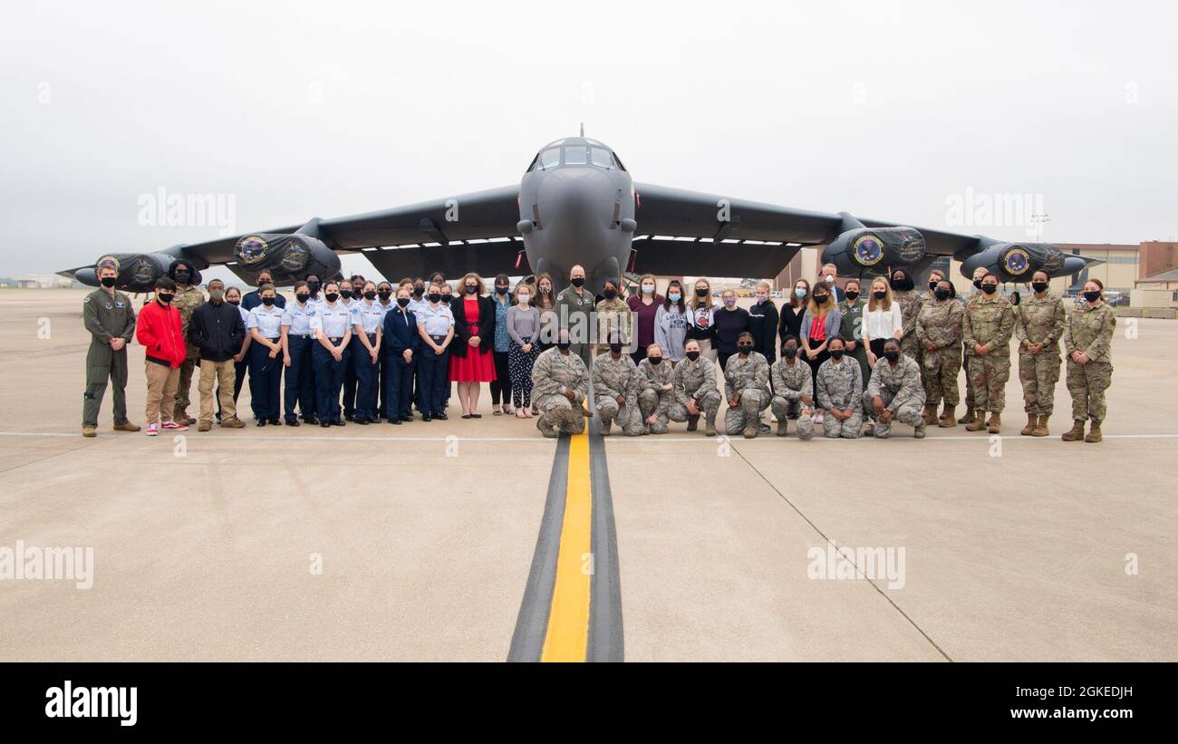 Local junior ROTC cadets pose for a photo near a B-52 with members from 8th Air Force at Barksdale Air Force Base, March 30, 2021. JROTC members from Airline and Parkway High School had an opportunity to ask questions and learn about the mission of the Mighty Eighth. Stock Photo