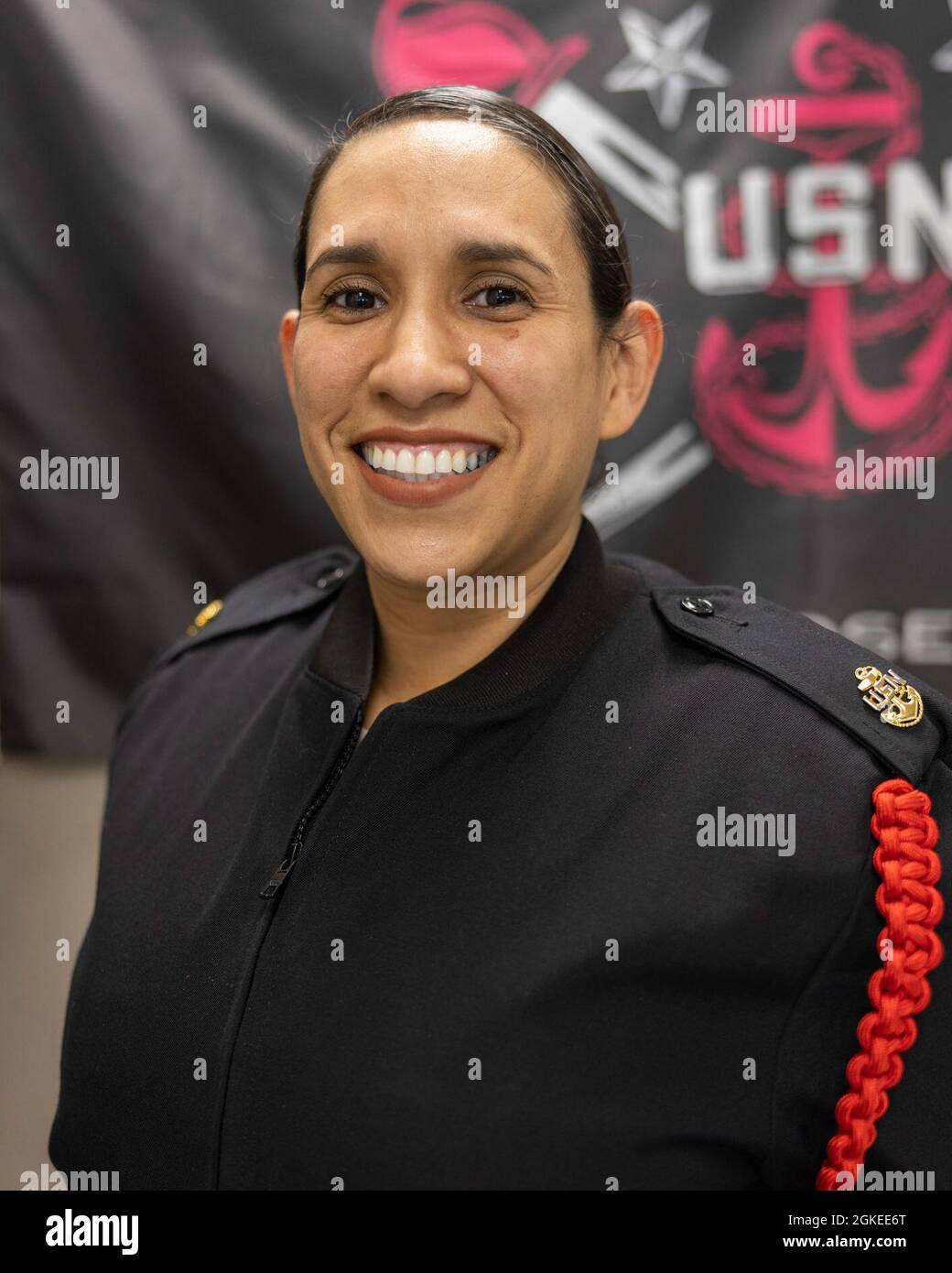 Chief Hospital Corpsman Paula Barney, a recruit division commander, poses for a portrait inside the USS Arleigh Burke recruit barracks at Recruit Training Command. More than 40,000 recruits train annually at the Navy's only boot camp. Stock Photo