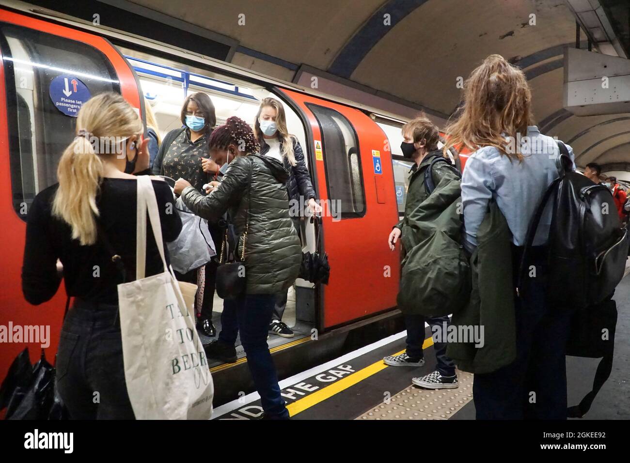 London, UK, 14 September 2021: as the government warns of the importance of personal responsibility in preventing a severe wave of Covid cases in the winter, most but not all passengers follow the rules and wear face coverings on the London Underground. Face masks are not required if a passenger has a medical reason for an exemption but increasing numbers of people seem to be without them. Anna Watson/Alamy Live News Stock Photo
