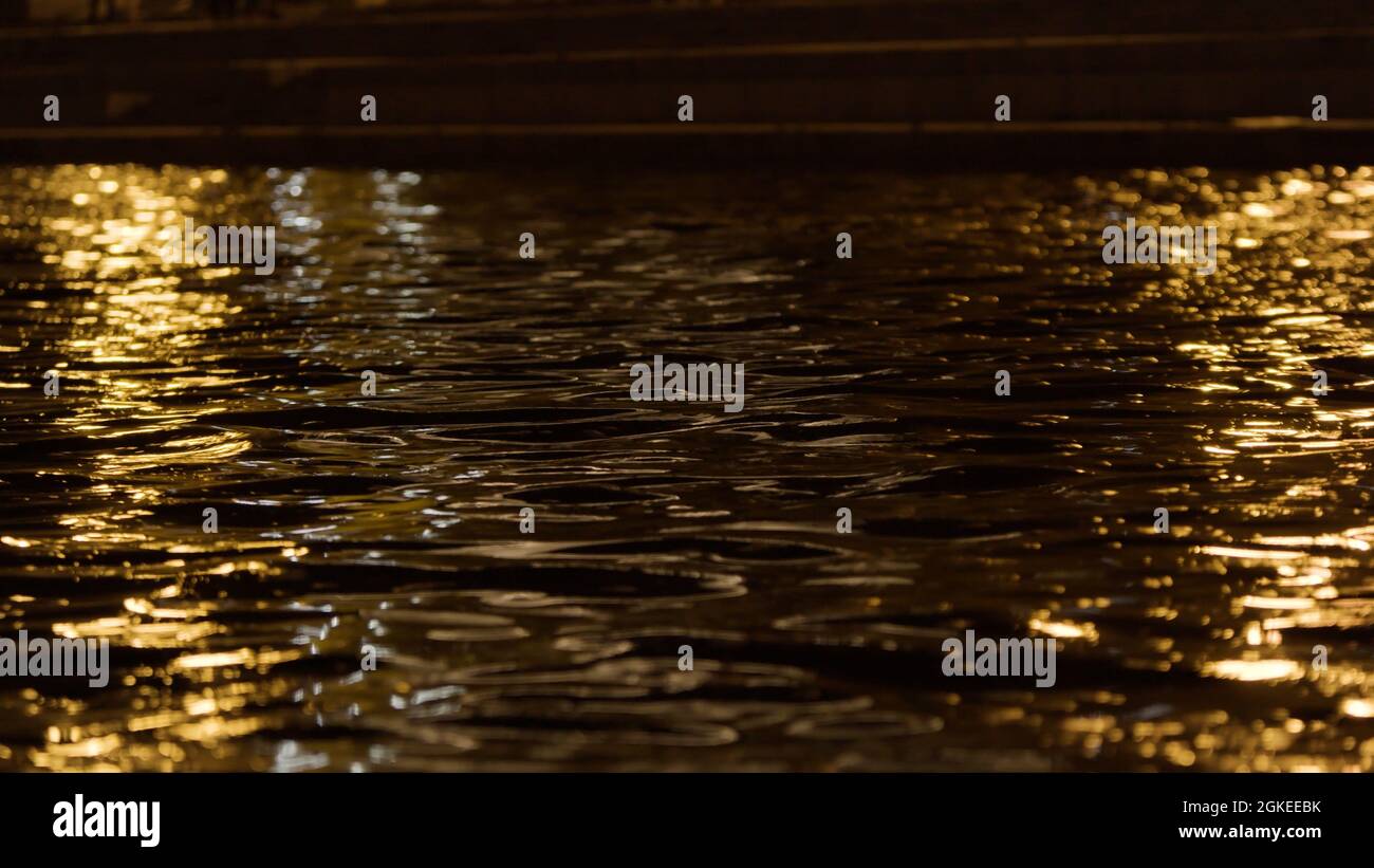 Water Ripples Night Beautiful night view of a city pond with ripples. Stock footage. Close ...