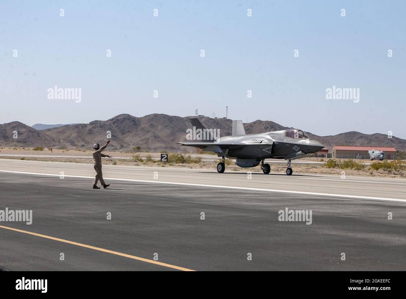 U.S. Marine Corps F-35B Lightning II, assigned to Marine Aviation Weapons and Tactics Squadron One (MAWTS-1), taxis the runway prior to a hot load exercise in support of Weapons and Tactics Instructor (WTI) course 2-21, at Laguna Army Air Field, Yuma, Ariz., March 30, 2021. The WTI course is a seven-week training event hosted by MAWTS-1, providing standardized advanced tactical training and certification of unit instructor qualifications to support Marine aviation training and readiness, and assists in developing and employing aviation weapons and tactics. Stock Photo