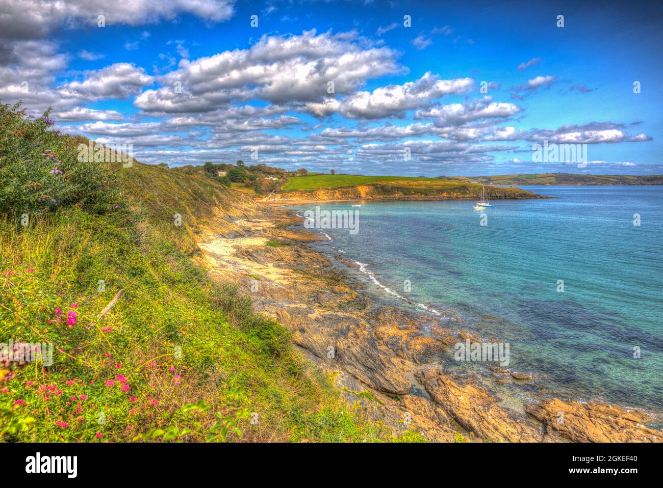 Porthcurnick Cornwall coast view to beach near Portscatho Roseland peninsula England UK colourful HDR Stock Photo