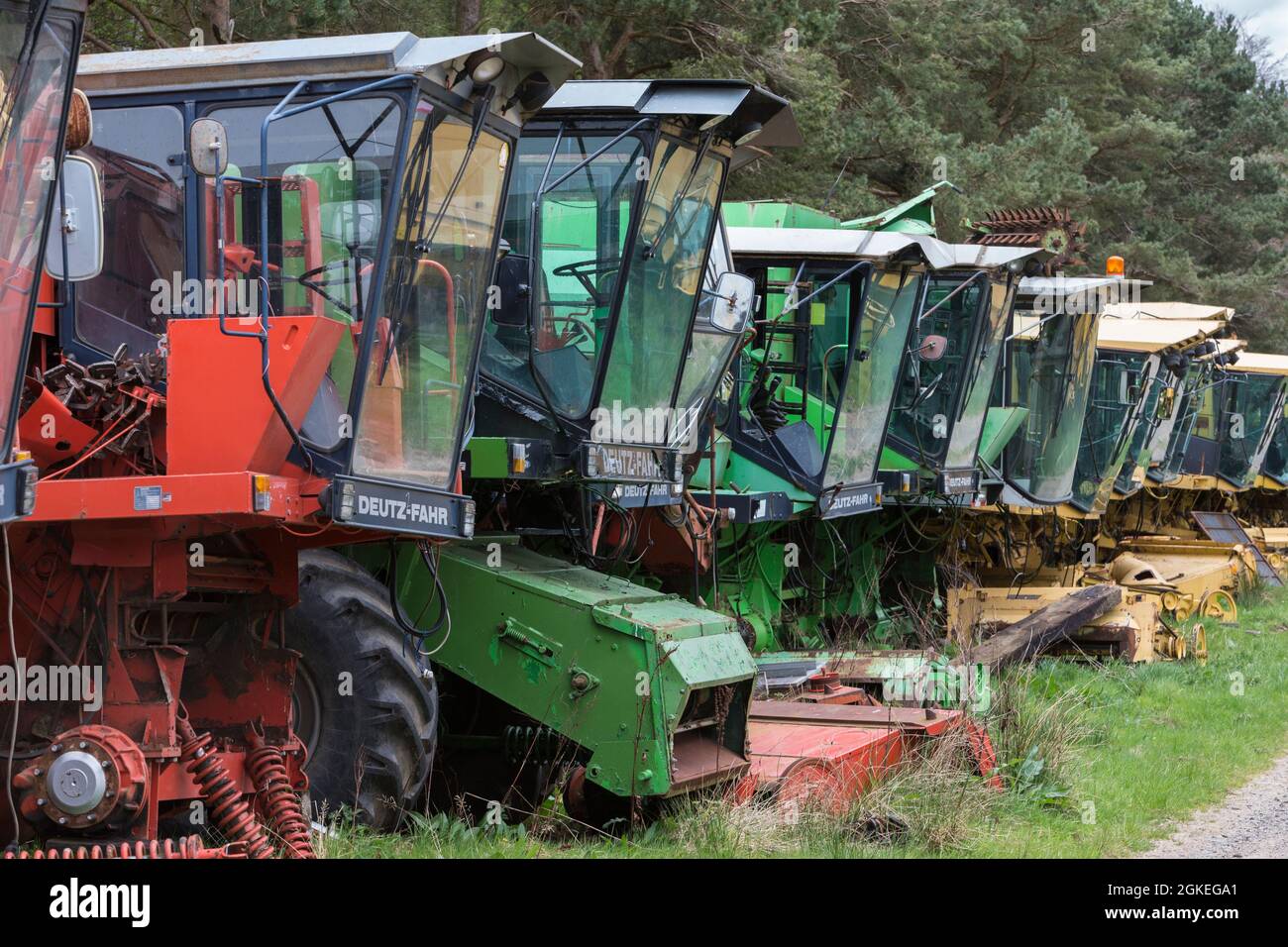 Combine harvester reclamation yard, Battle Bridge Farm, Alnwick, Northumberland, UK Stock Photo