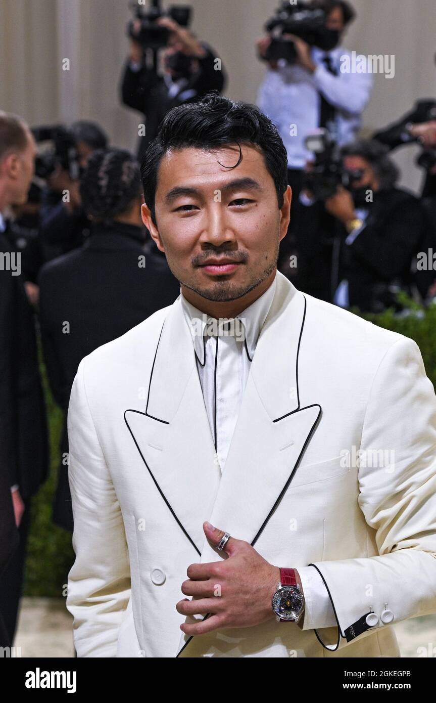New York, USA. 13th Sep 2021. Simu Liu walking on the red carpet at the 2021 Metropolitan Museum of Art Costume Institute Gala celebrating the opening of the exhibition titled In America: A Lexicon of Fashion held at the Metropolitan Museum of Art in New York, NY on September 13, 2021. (Photo by Anthony Behar/Sipa USA) Credit: Sipa US/Alamy Live News Stock Photo