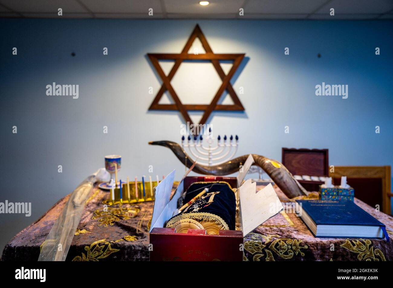 A custom Jewish table setting is displayed in the chapel at Al Dhafra Air Base (ADAB), United Arab Emirates, March 31, 2021. The chaplain corps at ADAB held a Passover Seder, the most commonly celebrated Jewish ritual, and livestreamed the ceremony to other installations in the U.S Air Forces Central area of responsibility. Stock Photo