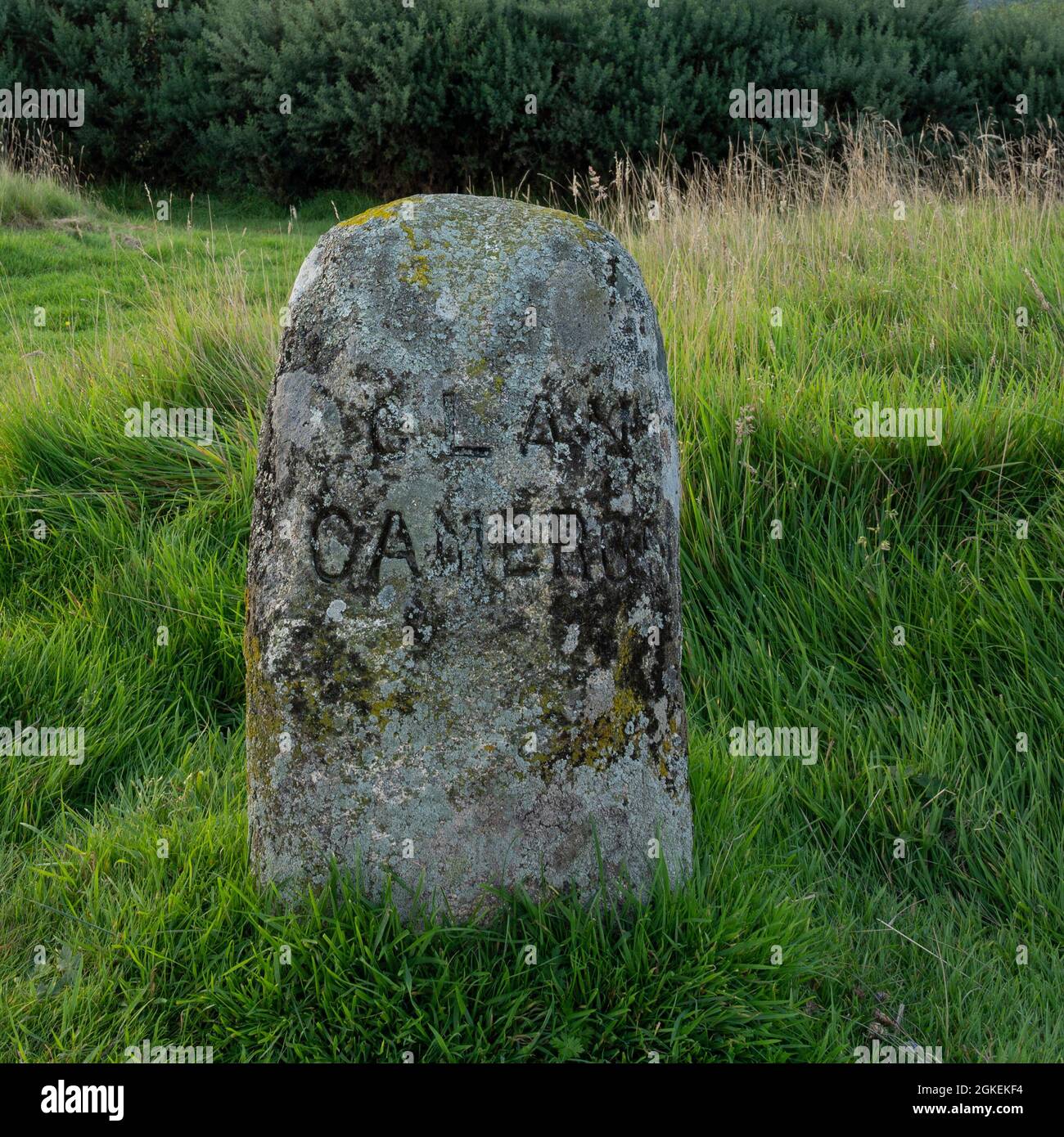 Culloden battlefield in Scotland. Isolated headstone for Clan Cameron with background of grass and other greenery. Stock Photo