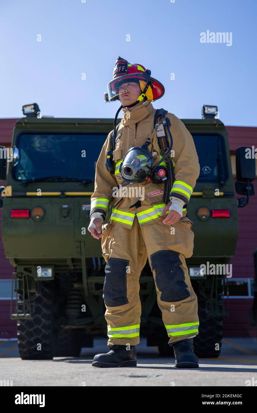 U.S. Marine Sgt. Qihang Lin, a station captain with Aircraft Rescue and Firefighting, Headquarters and Headquarters Squadron, Marine Corps Air Station Camp Pendleton, poses for a photo on MCAS Camp Pendleton, California, March 31, 2021. Lin was recognized as the 2020 Marine Corps Firefighter of the Year for his dedication to improving himself and the Marines around him. Stock Photo