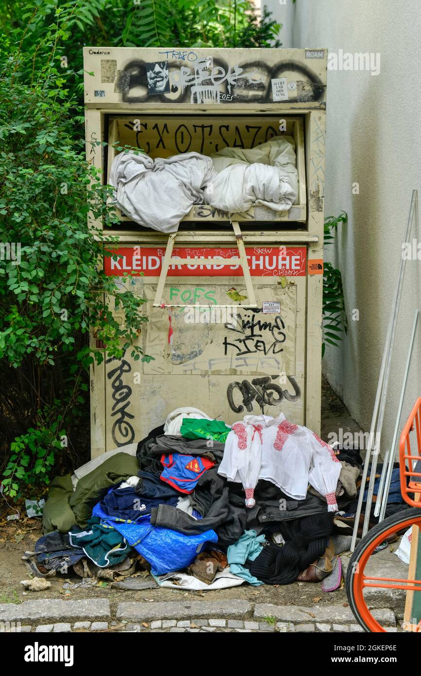 Dirty old clothes container, Bergstrasse, Mitte, Berlin, Germany Stock