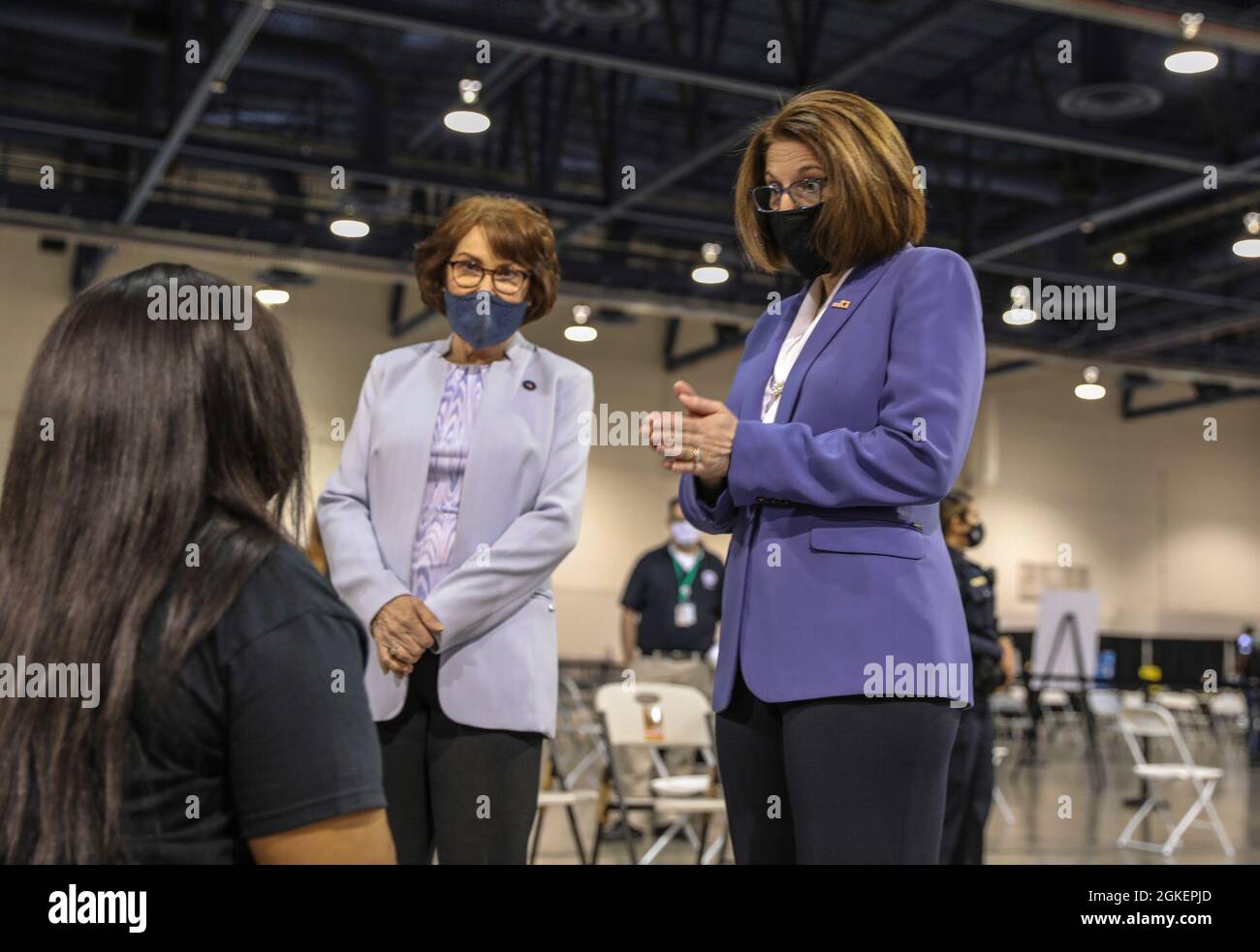 U.S. Senator’s Catherine Cortez Masto (right) and Jacky Rosen talk with local Las Vegans after they received their COVID-19 vaccine at Cashman center, Thursday, Apr. 1, 2021 in Las Vegas, Nevada. Stock Photo