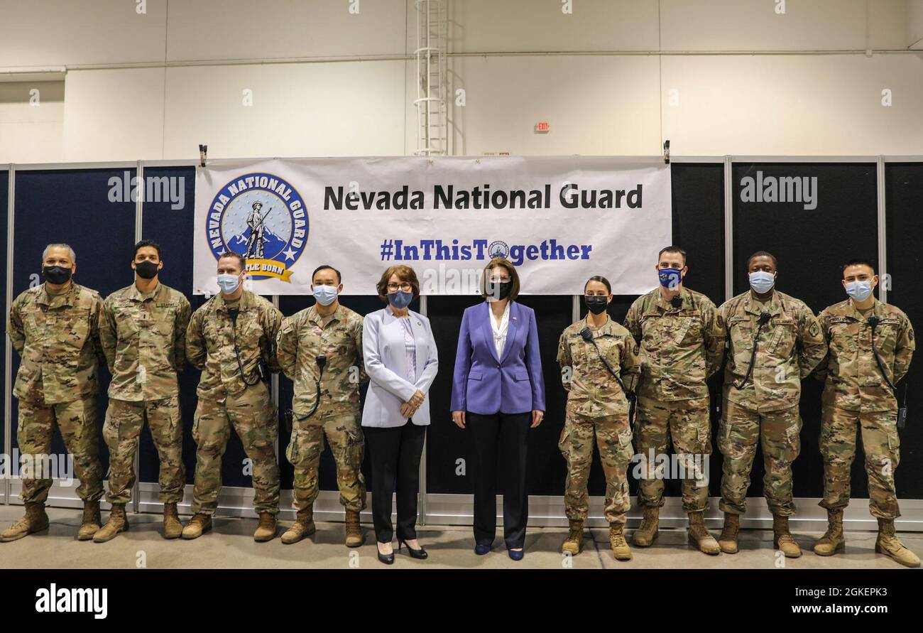 U.S. Senator’s Jacky Rosen (center left) and Catherine Cortez Masto visit with Nevada Guardsmen working with Joint Task Force 17 at the Cashman vaccine center, Thursday, Apr. 1, 2021 in Las Vegas, Nevada. Stock Photo